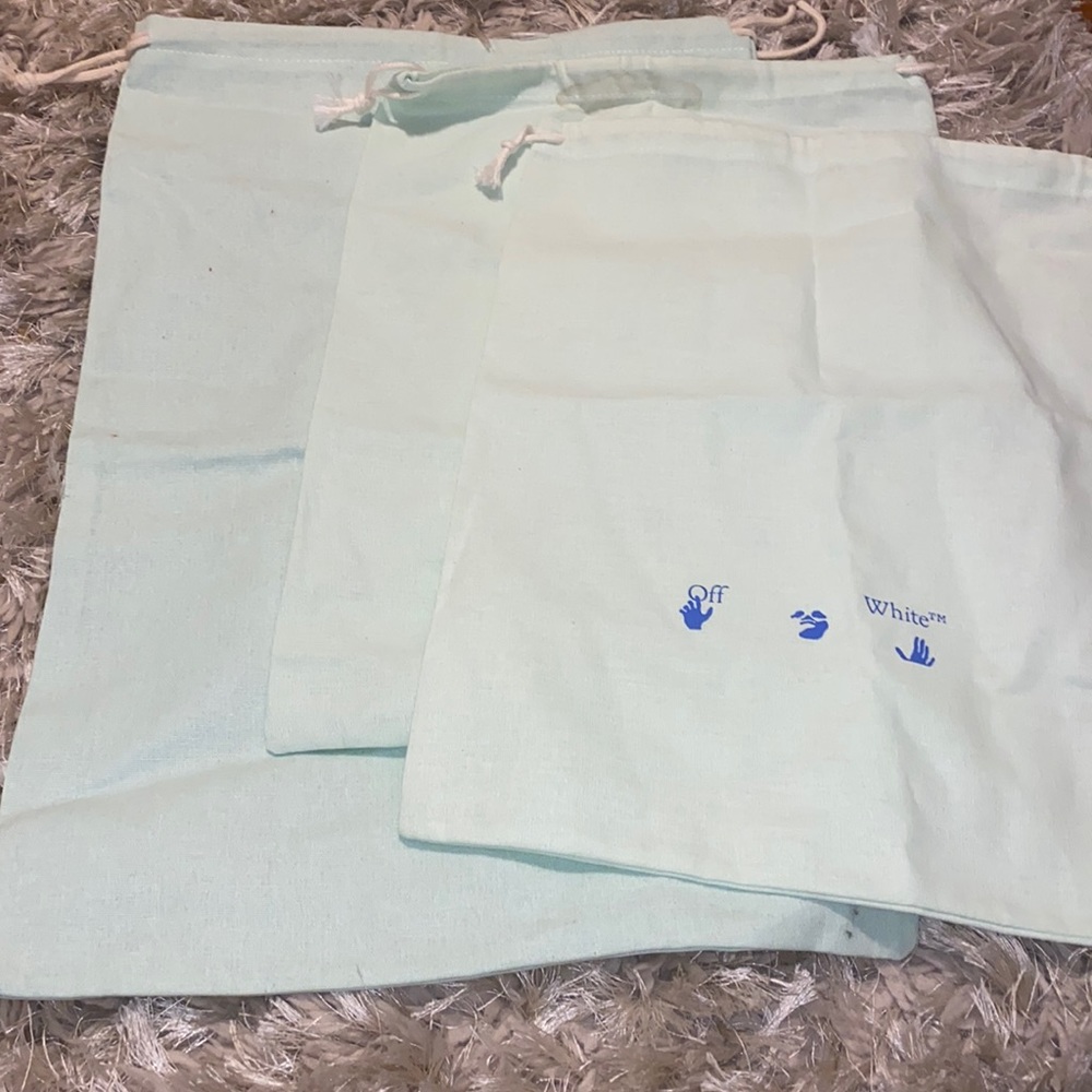 Off white dust bags (3)